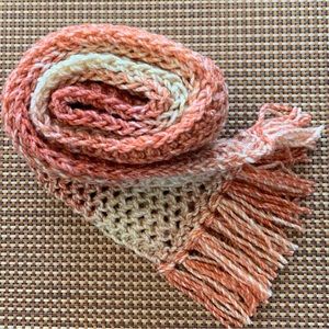 Scarf. New. Adult size. Burnt orange color.